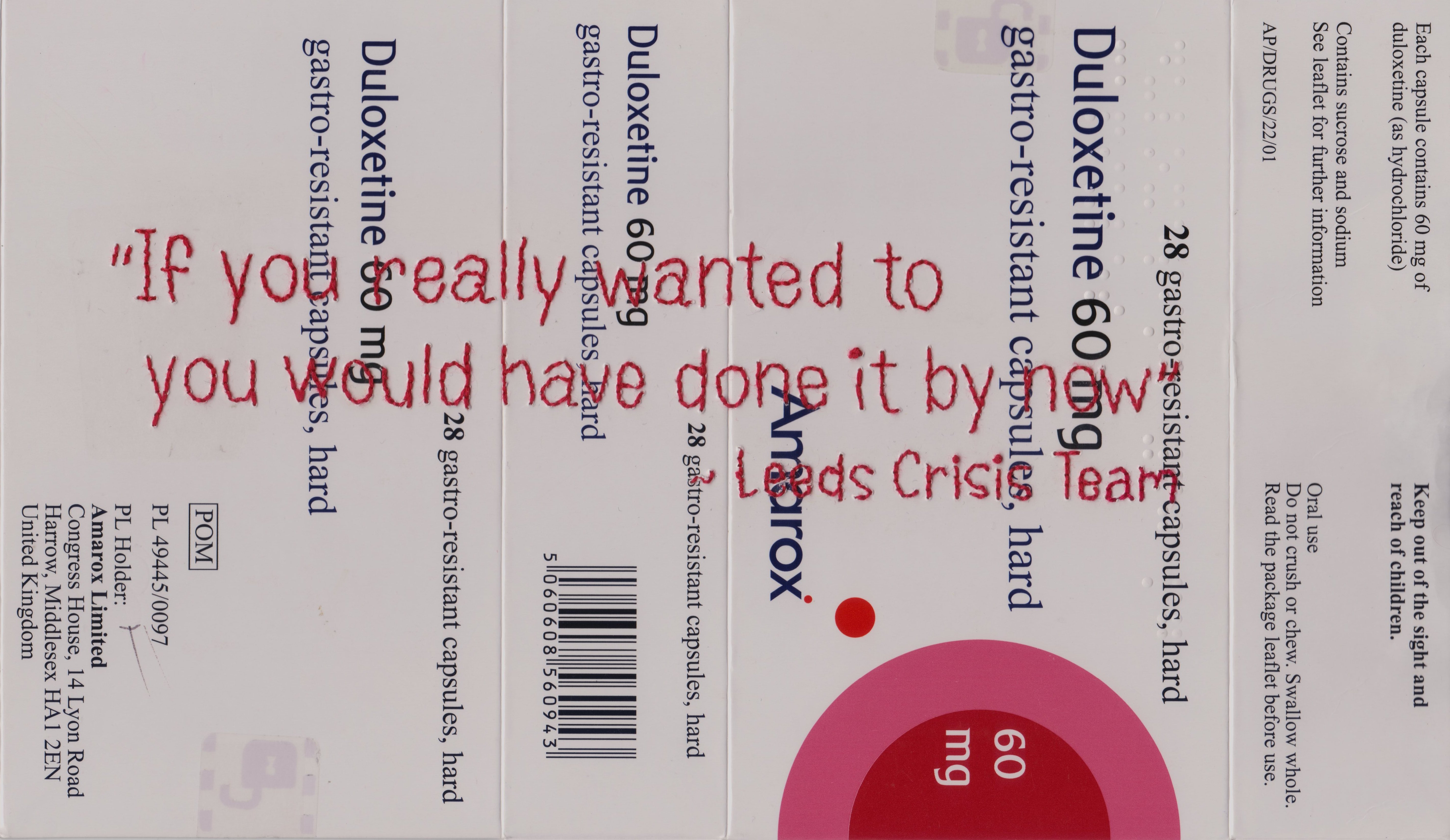 The words "If you really wanted to you would have done it by now - Leeds Crisis Team" have been hand stitched onto a medication packet for antidepressants.